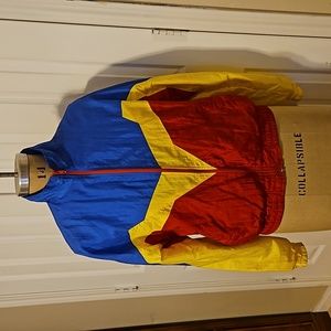Blue, yellow, and red wind breaker